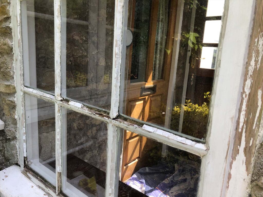 Old sash window in need of renovation